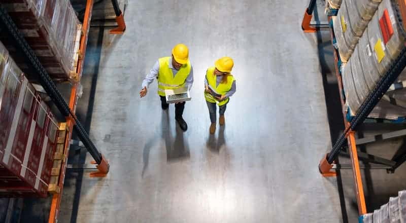 Workers operating with a multi-warehouse strategy.