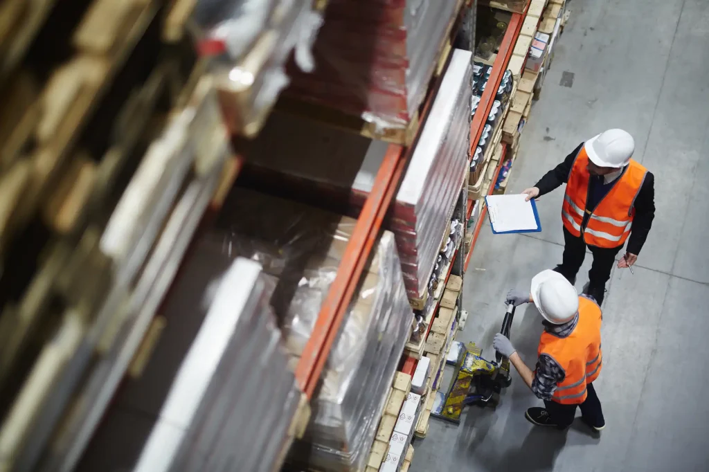 Team member reviewing SKUs during a warehouse audit.